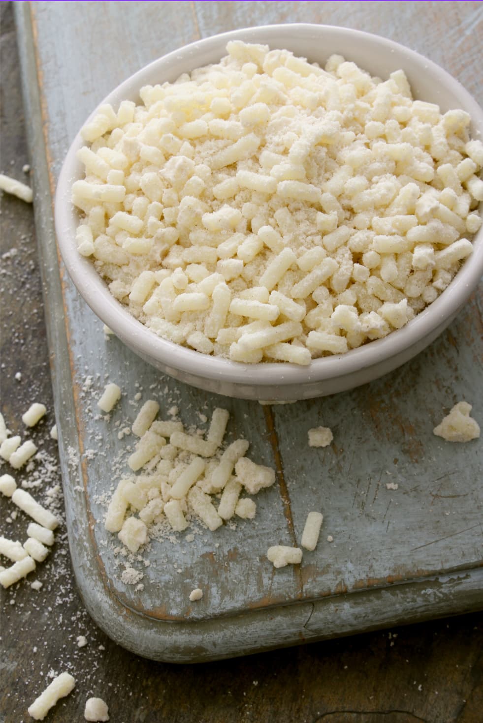 Grass-fed ground beef suet in a rustic bowl — the raw material for clean wet-rendered tallow